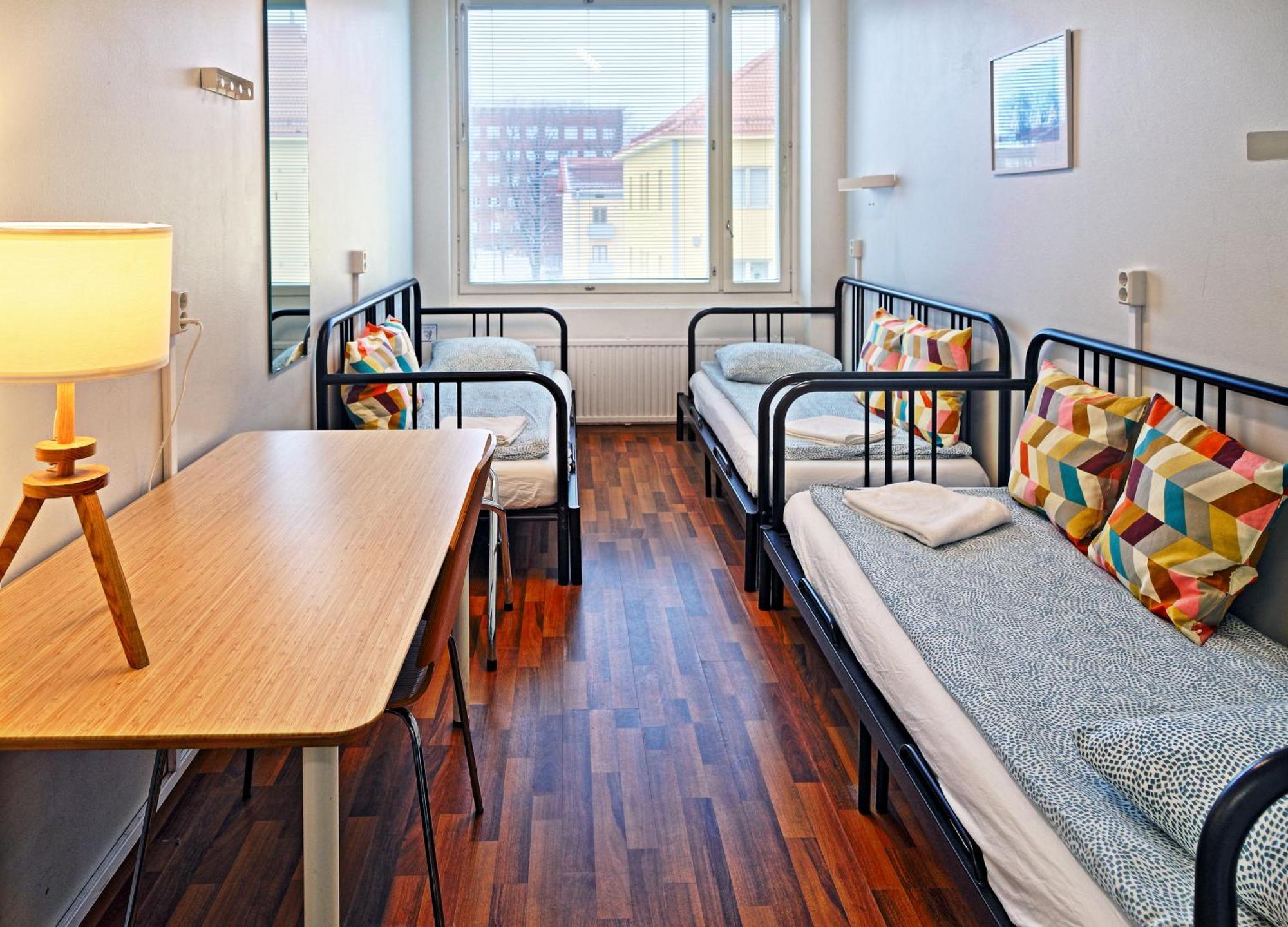 Dreibettzimmer mit Gemeinschaftsbad